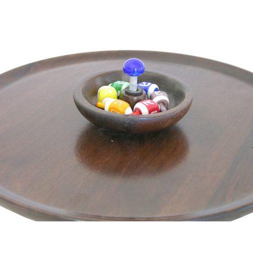 colorful glass dreidles and dreidle spinning board