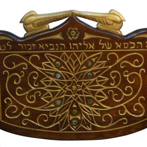 carving and gold detail with gold cherubim on kise eliyahu for synagogue