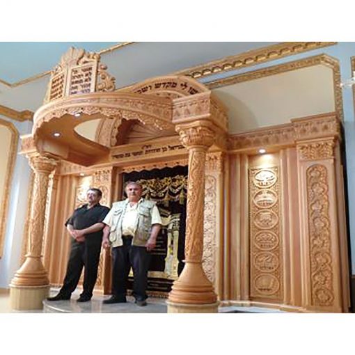 Carved domed top aron kodesh in synagogue with twelve tribes