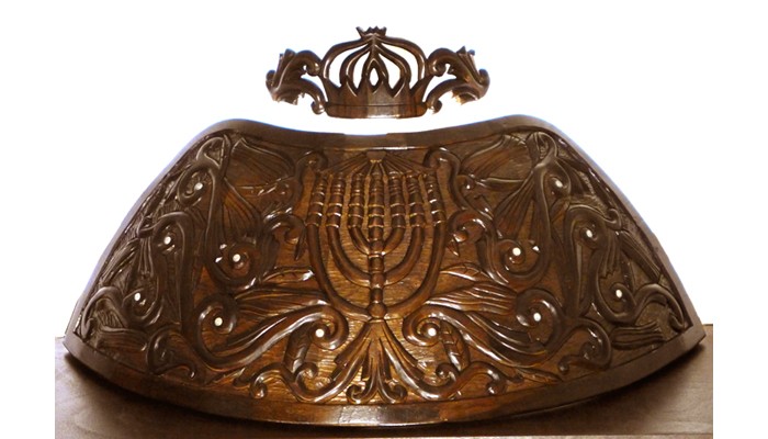 dome top of crown with deep relief carving