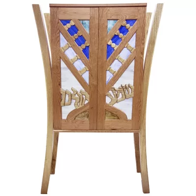 aron kodesh with menorah carved wood doors and stained glass shema kolenu