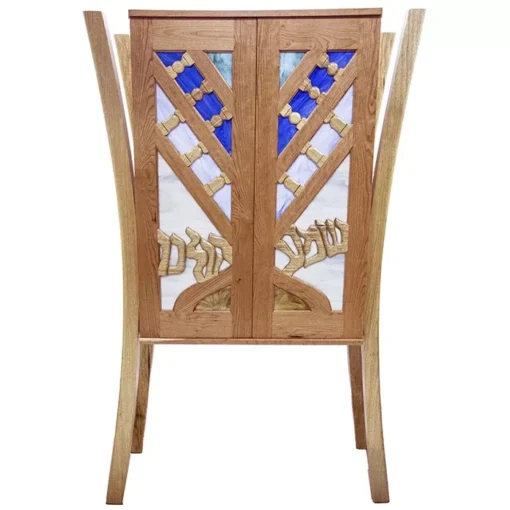 aron kodesh with menorah carved wood doors and stained glass shema kolenu