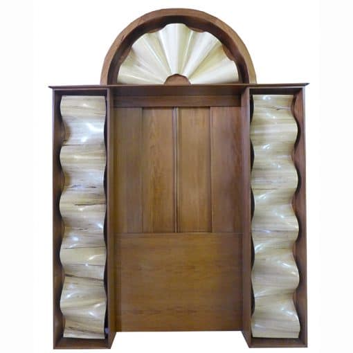 front view of torah ark with carved wood waves