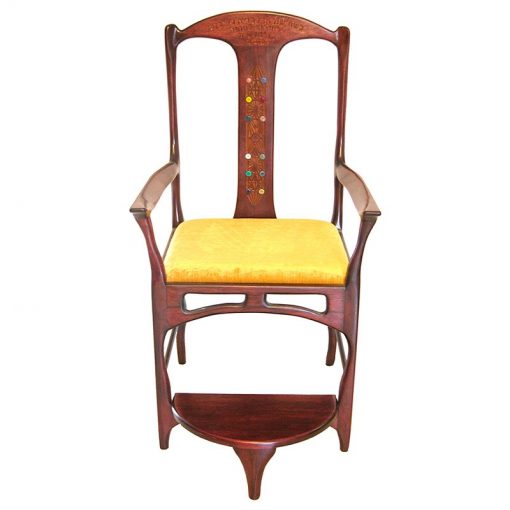 Elijah's chair in contemporary design built from solid wood and carved