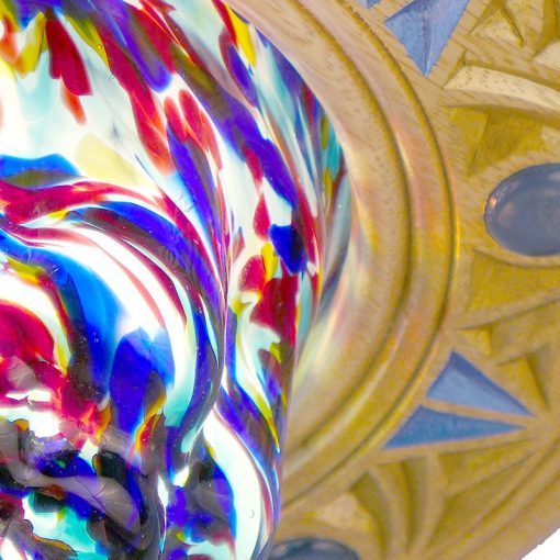 detail of mold blown glass and carving on eternal light