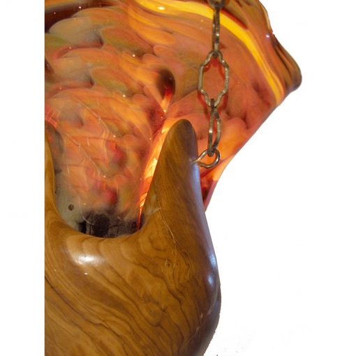 details of olive wood ner tamid with blown glass in lapiz color