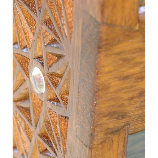 podium detail of carving and glass inlays