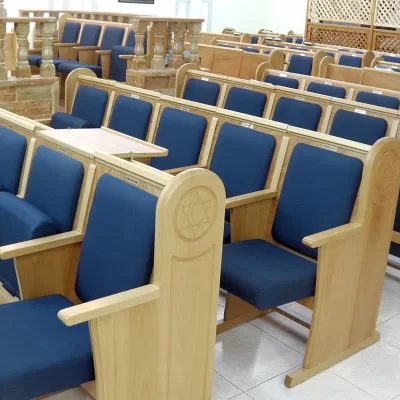 upholstered and carved sephardic synagogue seating with upholstery