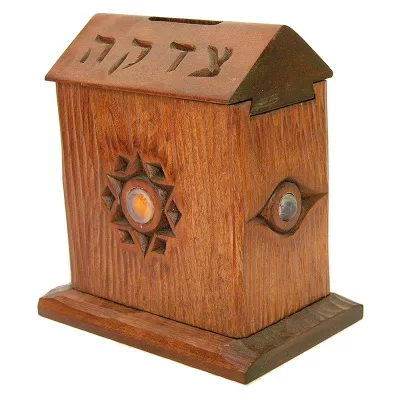 Sliding top tzedkaah box with hand carving and glass inlays