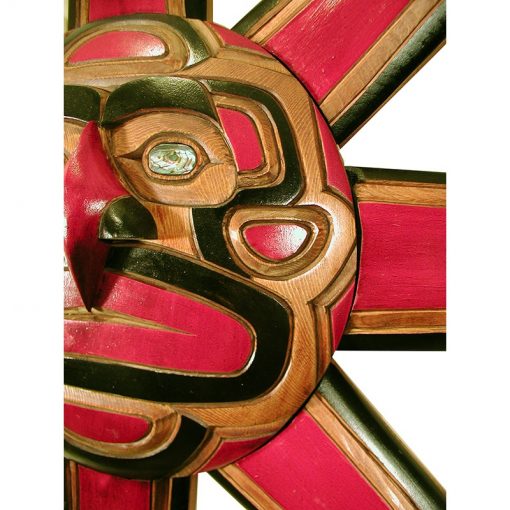detail of sun mask wood carving northwest coastal style
